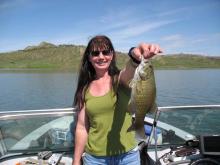 Aydrey Harmschild of Miles City, MT with a 2 pound smallmouth bass.