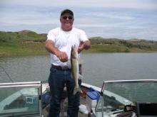 Greg Blind of Miles City, MT with a 20 walleye.