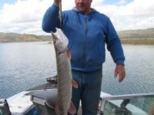 Mike Losinski of Cohagen, MT with a 11 pound northern pike.