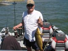 Neil Martin of Miles City, MT with a 7 pound carp that was supposed to be a walleye.