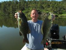 Rob Marshall of Helena, MT with a 3 and 4 pound smallmouth bass caught 5 minutes apart.