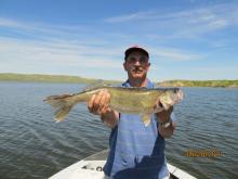 Cal Hertoghe of Billings, MT with a 24 6 pound walleye.