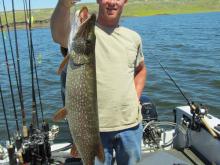 Leo Pluhar of Miles City, MT with a 6 pound northern pike.