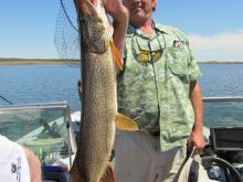 John Ensign of Miles City, MT with a 16 pound northern pike.