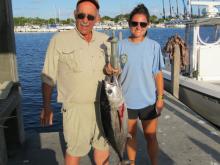 Myself and a creel clerk with my 22 pound blackfin tuna