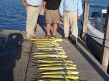 A. Dood, myself, and Monte Reder with our second days catch.