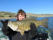 Roxana Brush of Miles City, MT with a 4.5 pound smallmouth bass.