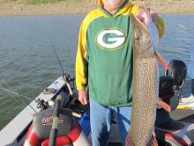 Dick Birkholy of Lincoln, MT with a 36,13.3 pound northern pike.