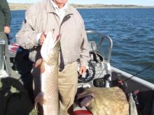 Earl Kunn of Billings, MT with a 21.5 pound, 42 northern pike.