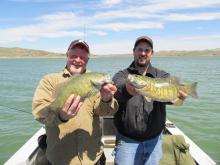 Dale Skinner of Stanford, MT and Brad Leap of Leweistown, MT with two 18 smallmouth bass.