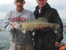 Teammates Bernie Hildebrand and C.B. Schantz with a 30-inch walleye caught during the Montana Governor's Cup Walleye Tournament.