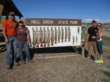 Clint Riesland, Cody Thatcher, Andrew Trouten and Rebecca Bingaman with their days catch.