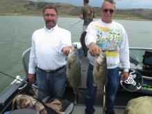 Robert Vetch and Randy Larson with two nice smallmouth bass.