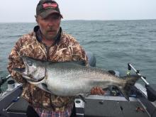 Dennie Linch of Payson, UT with a 27 pound King Salmon.