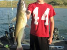 Kaden Hensleigh with a 7 pound catfish.