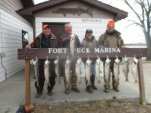 Bill Barber, Ron Patrick, Rick Kiekowand Ralph Patrick with their days catch of lake trout.