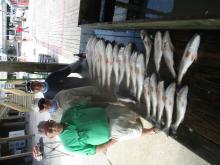 Tom Childress, Monte Reder and myself with a days catch of sea trout and redfish.