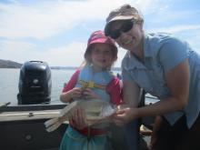 Della and Mia Lonner with a freshwater drum.